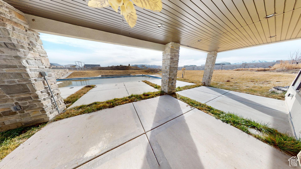 View of patio / terrace with an outdoor pool