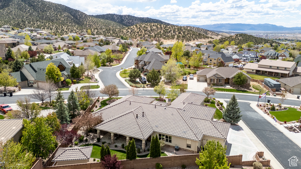 Aerial view featuring a mountain view and a residential view