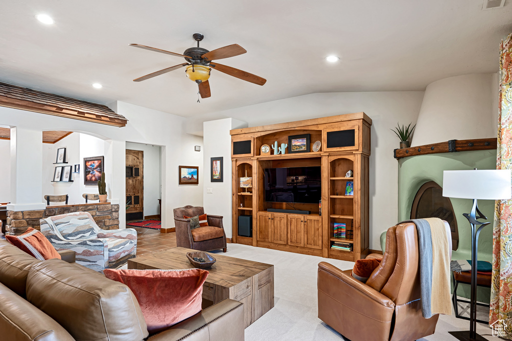 Living area with a ceiling fan, vaulted ceiling, recessed lighting, and visible vents