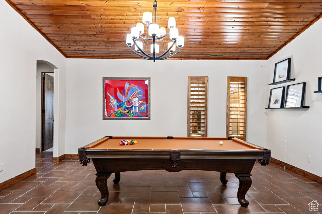Playroom with pool table, wooden ceiling, and baseboards