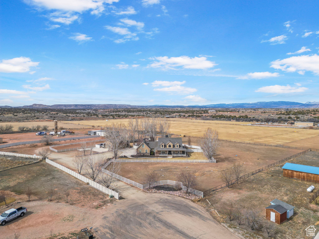 Aerial view featuring a rural view and a mountain view