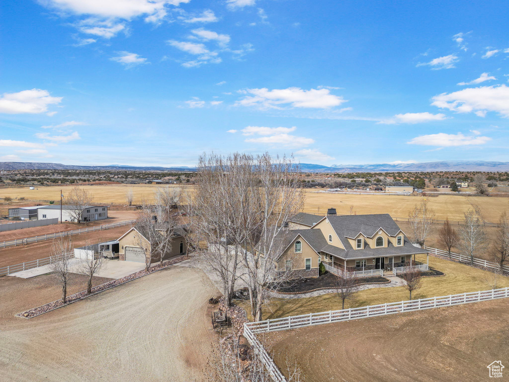 Birds eye view of property featuring a rural view and a mountain view