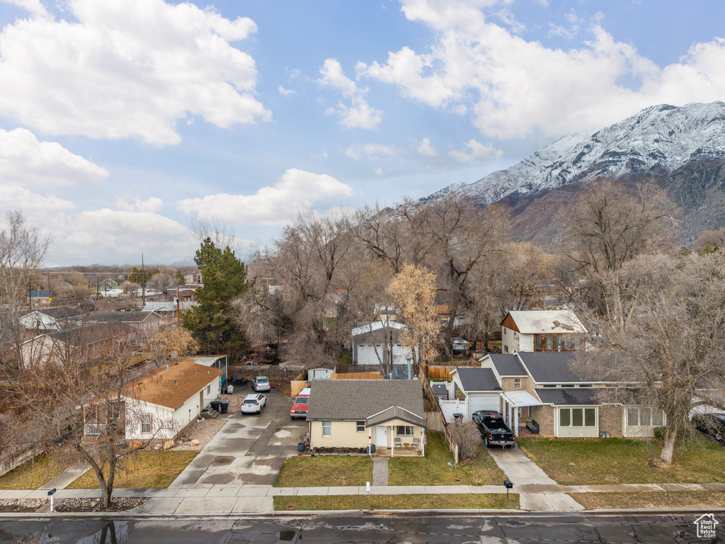 Drone / aerial view featuring a residential view and a mountain view