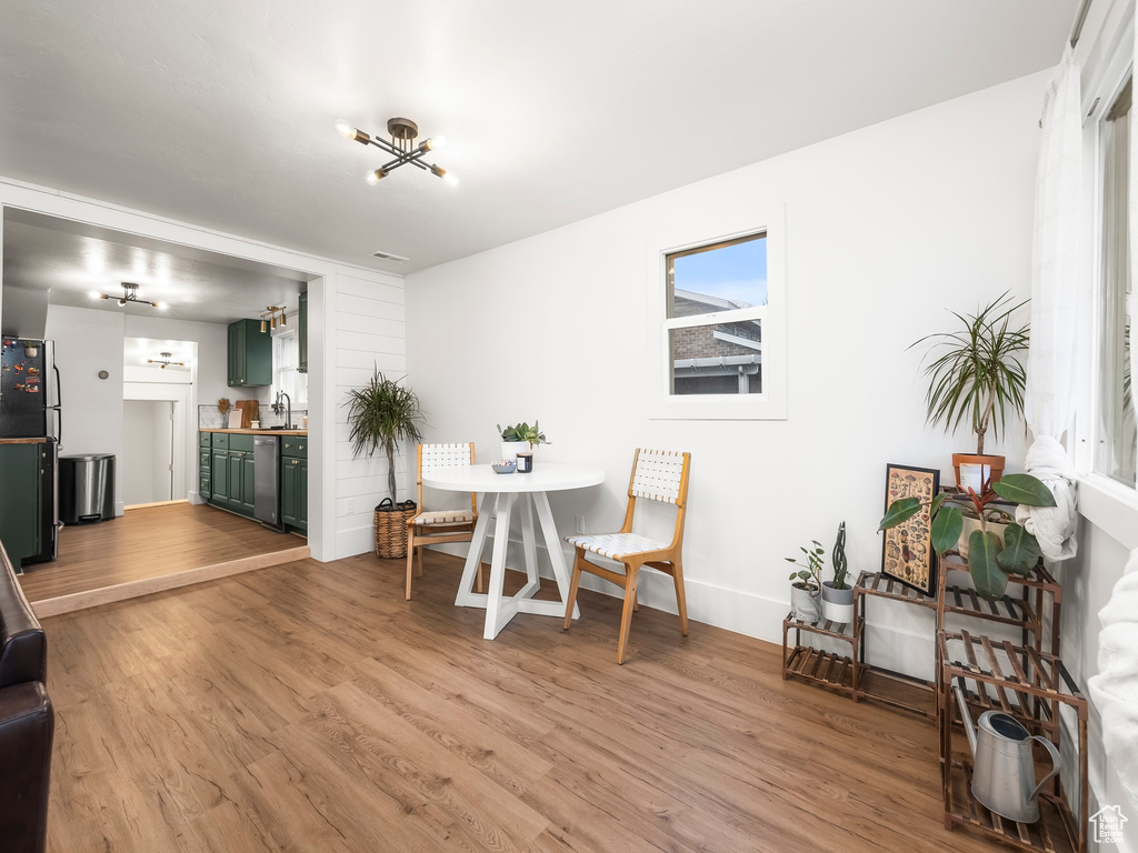 Dining room with light wood finished floors