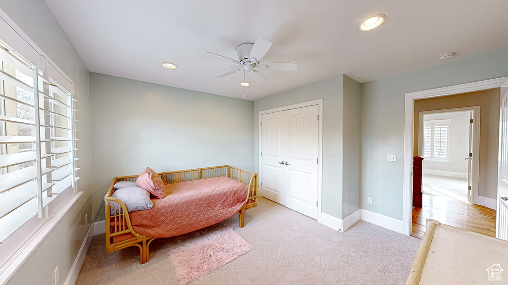 Bedroom with carpet, baseboards, a ceiling fan, recessed lighting, and a closet