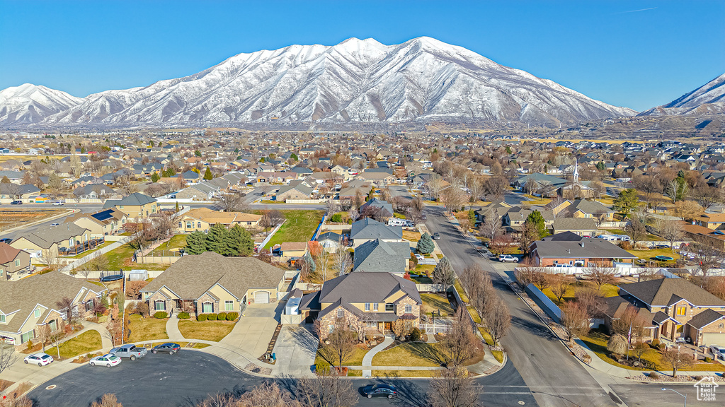 Drone / aerial view featuring a mountain view and a residential view