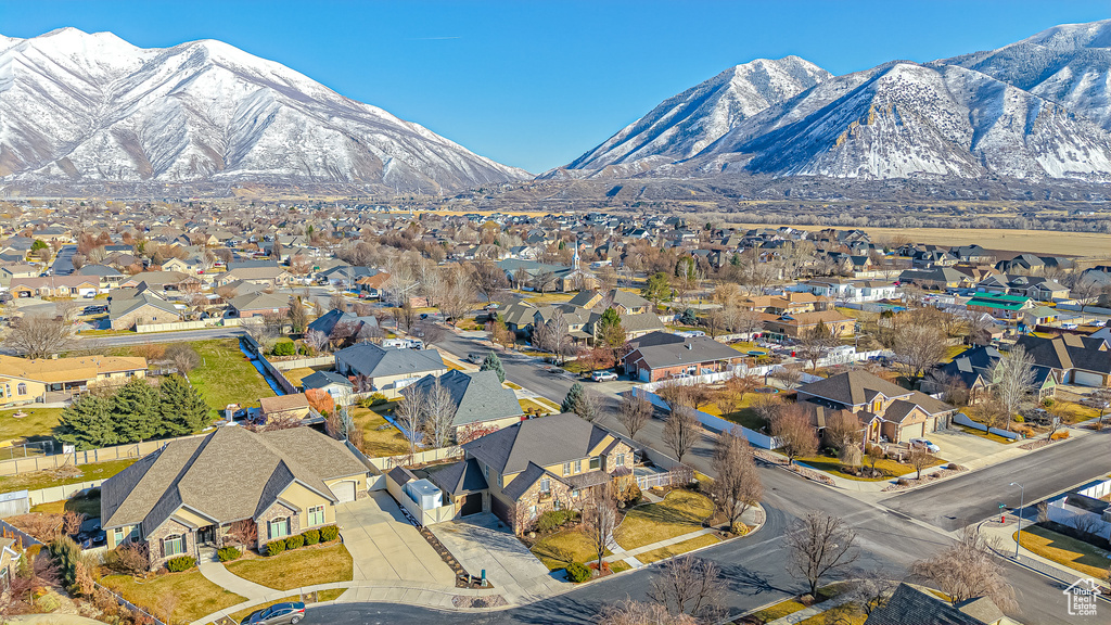 Aerial view featuring a mountain view and a residential view