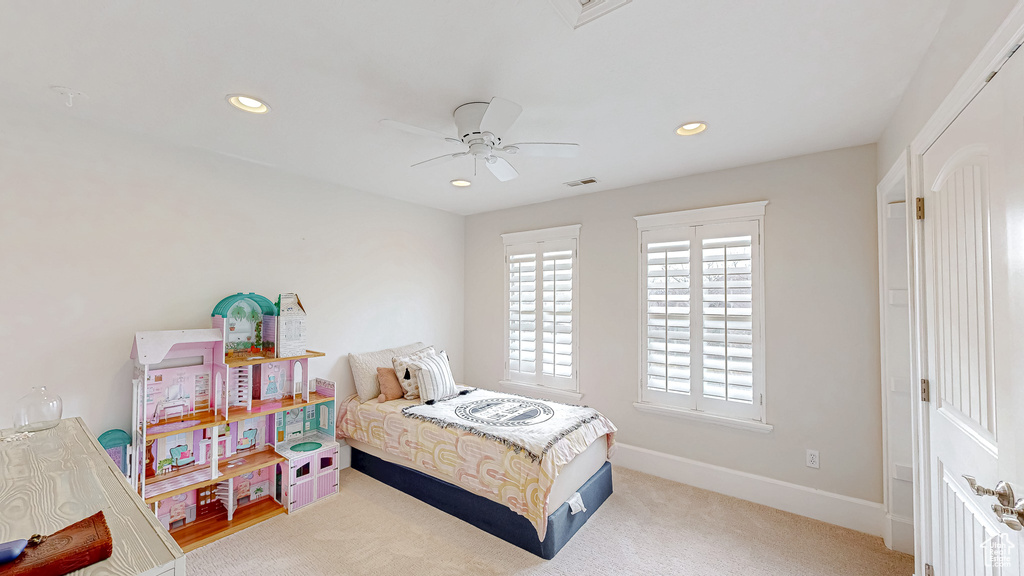 Bedroom with visible vents, baseboards, recessed lighting, ceiling fan, and carpet flooring