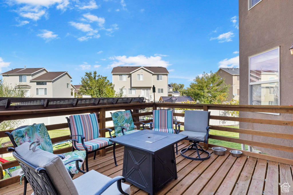 Wooden deck featuring a residential view