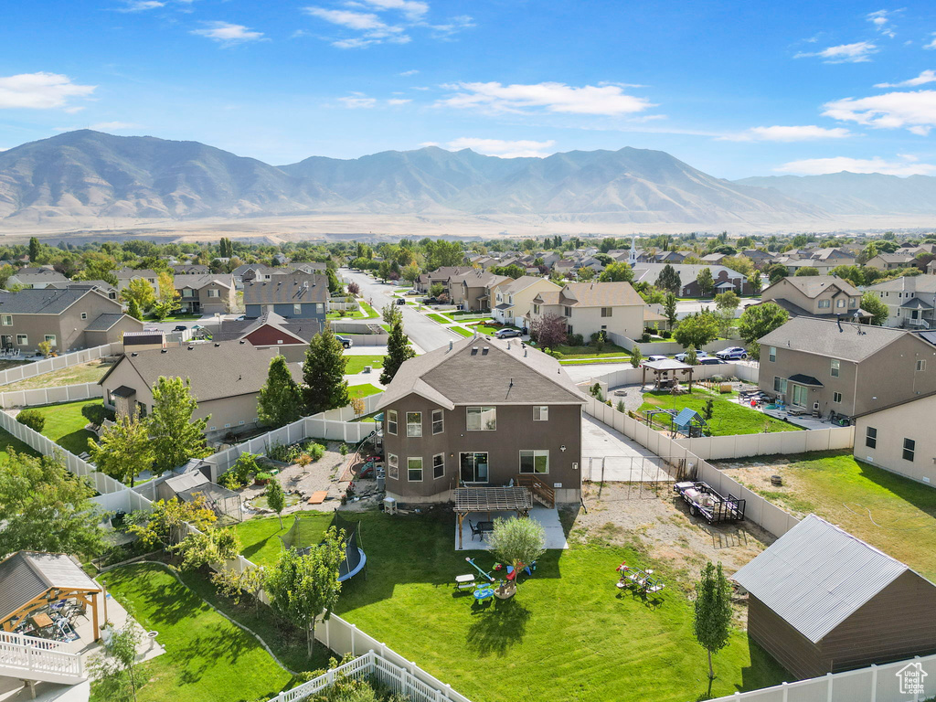 Aerial view featuring a residential view and a mountain view