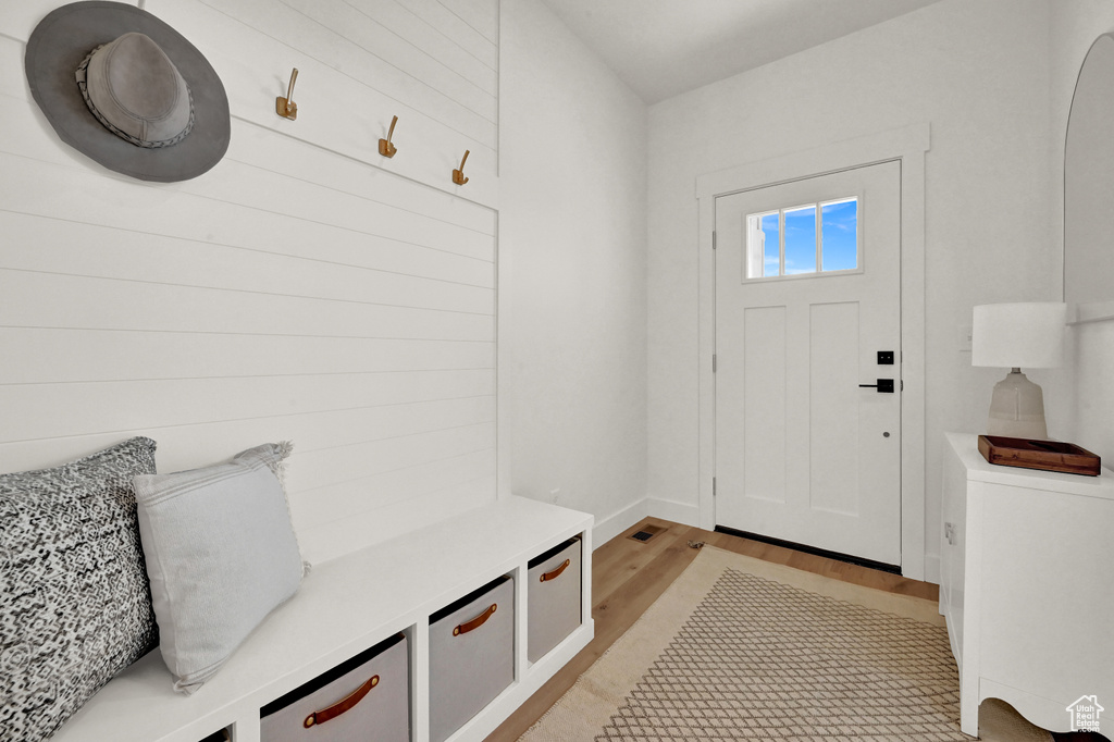 Mudroom with light wood-type flooring