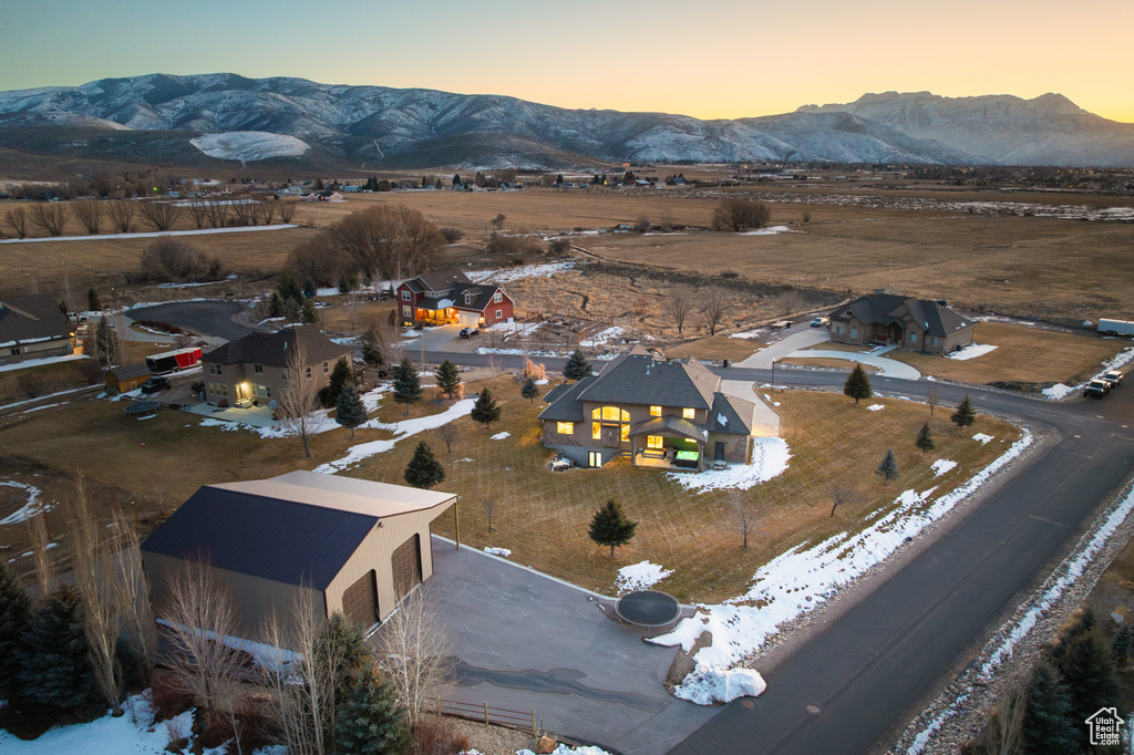 Aerial view at dusk with a mountain view