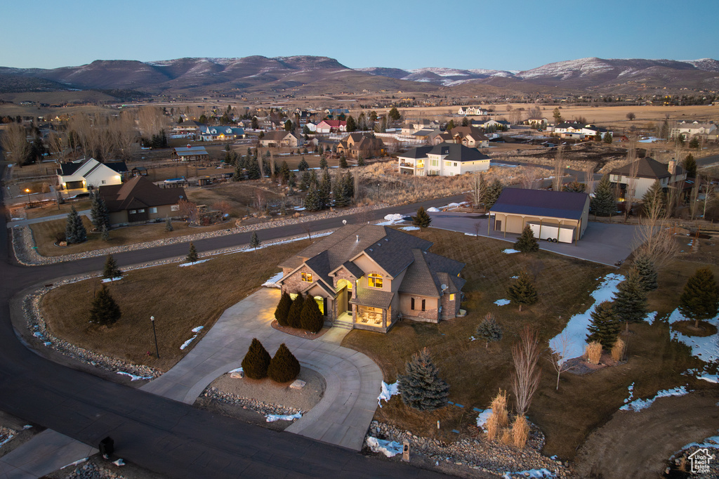 Birds eye view of property featuring a mountain view and a residential view
