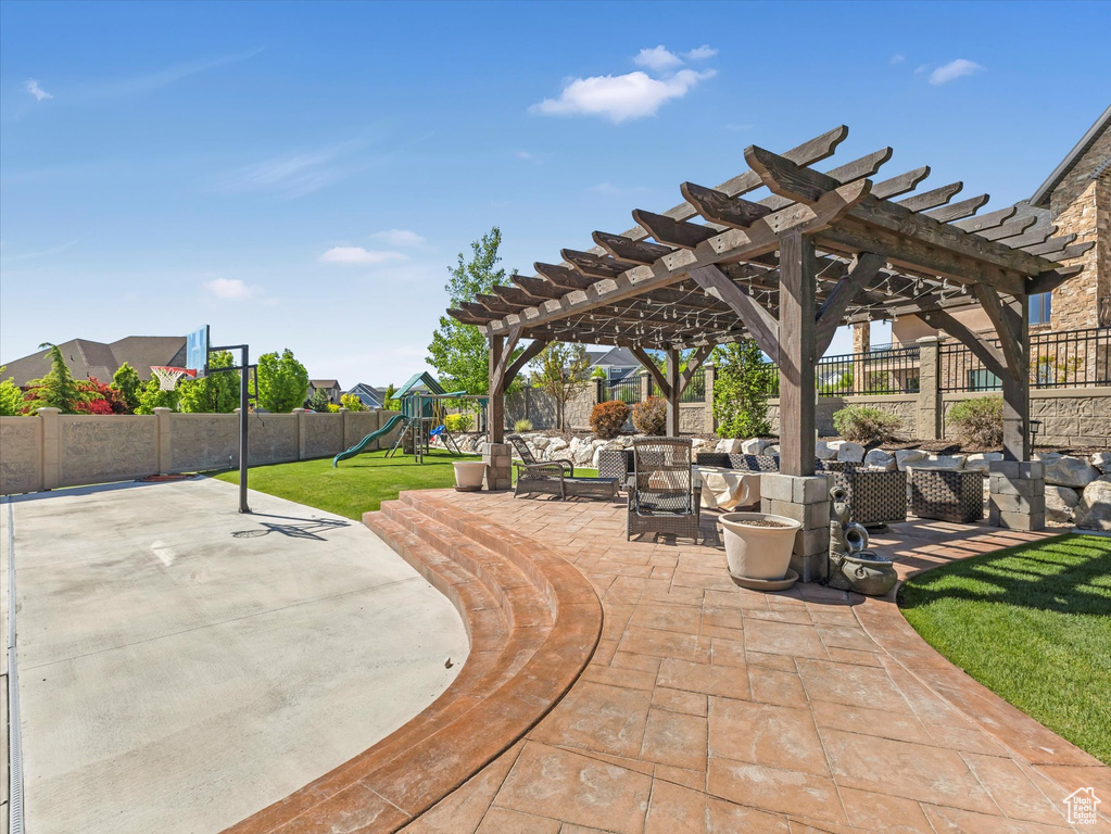 View of patio / terrace with a pergola and an outdoor living space