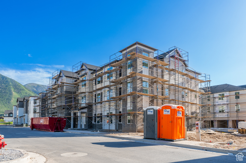 View of apartment building / complex with a mountain view