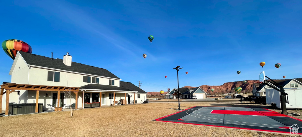 View of sport court featuring community basketball court