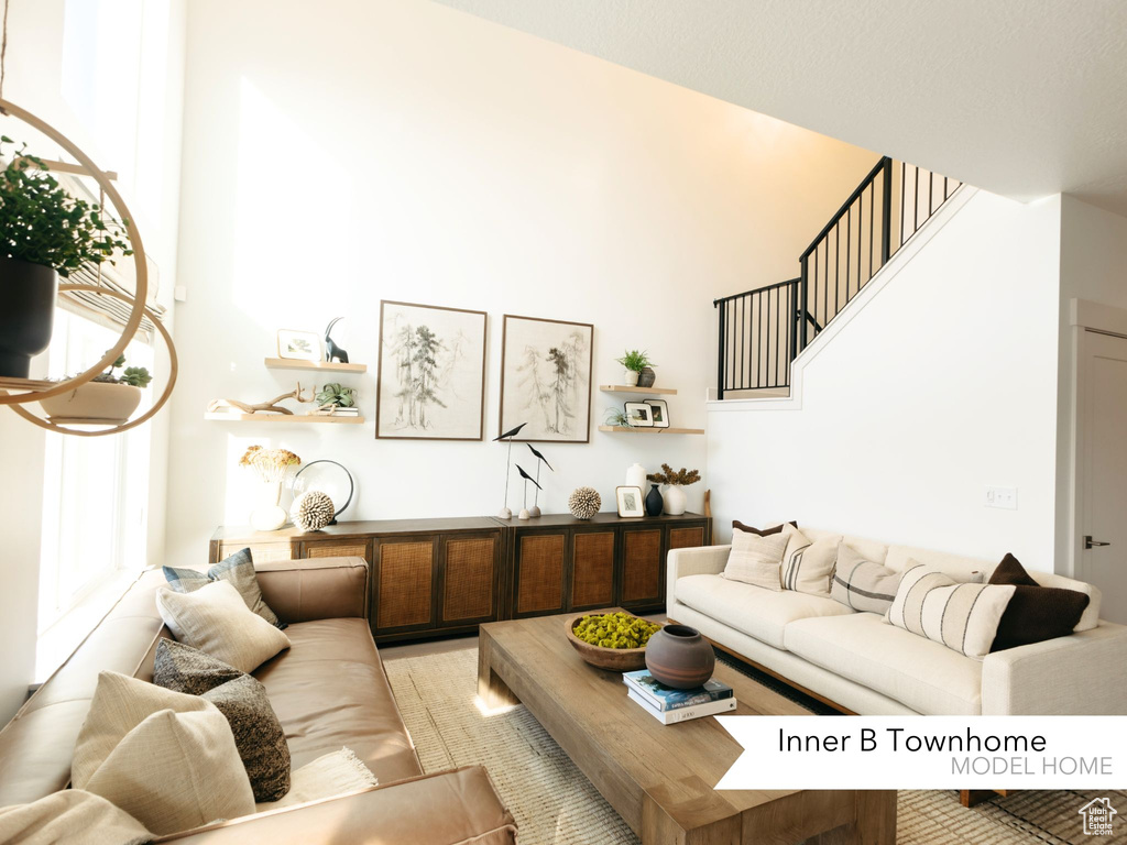 Living area with a towering ceiling