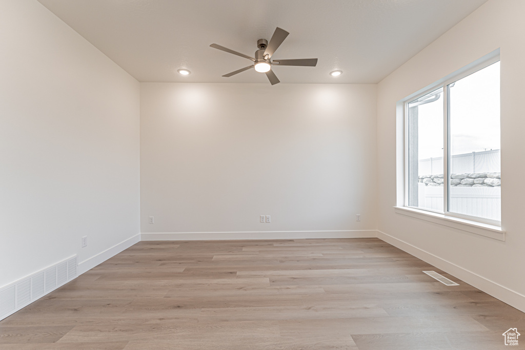 Spare room featuring ceiling fan, recessed lighting, and light wood-style flooring