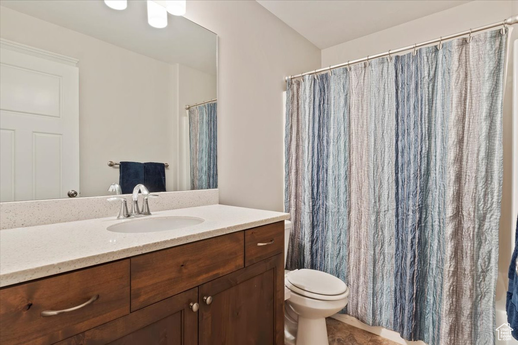 Bathroom featuring toilet and vanity