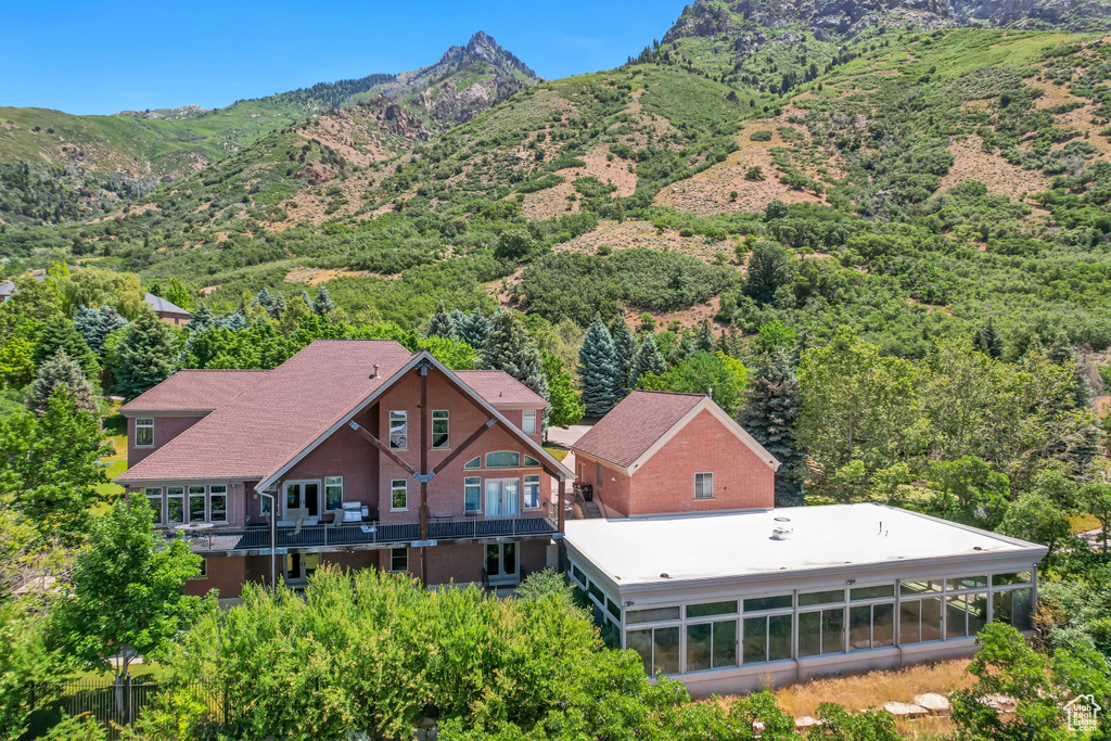 View from above of property featuring a mountain backdrop