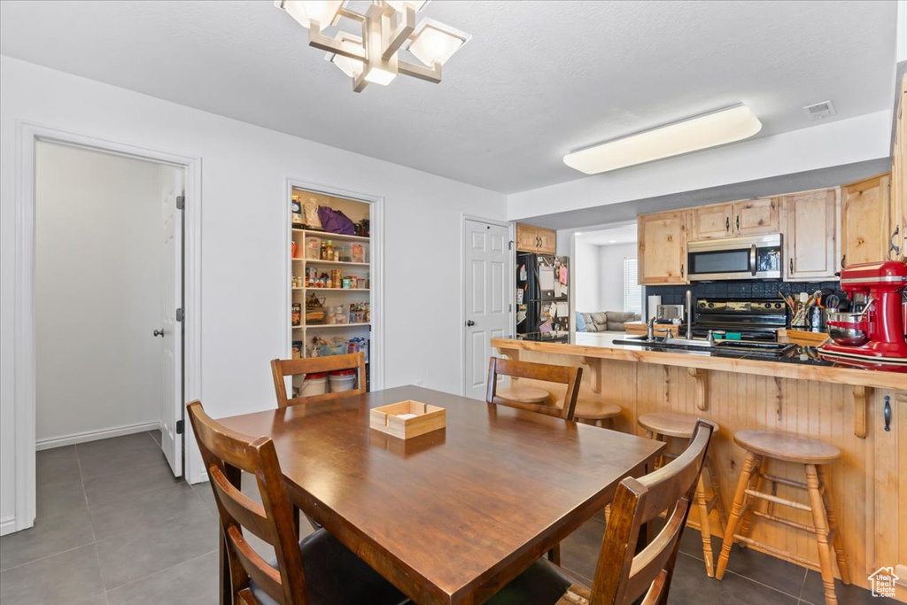 Dining room featuring tile patterned floors