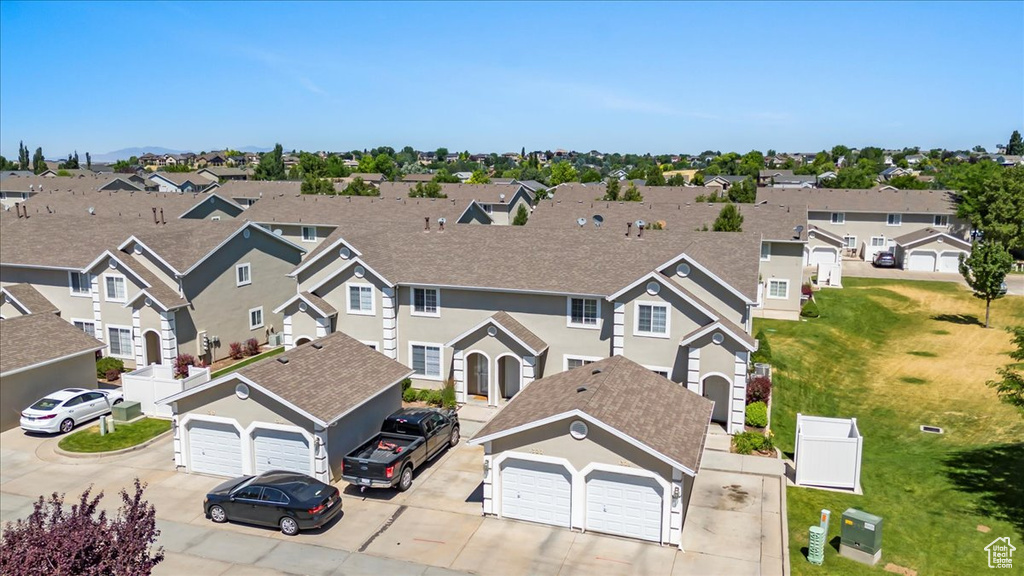 Birds eye view of property with a residential view