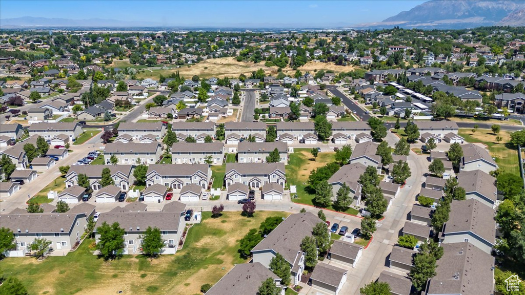 Birds eye view of property with a residential view