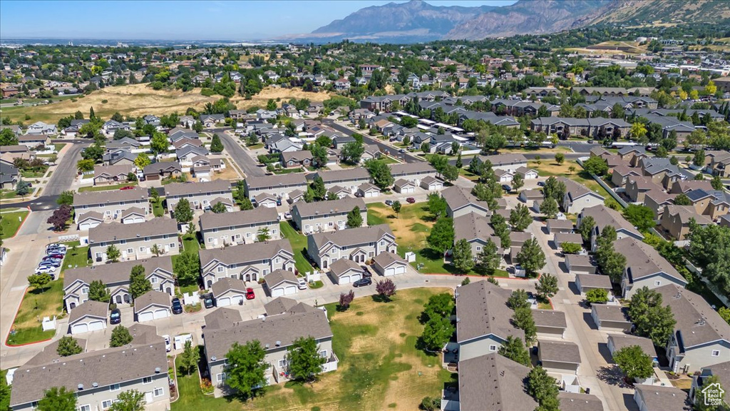 Drone / aerial view featuring a residential view and a mountain view