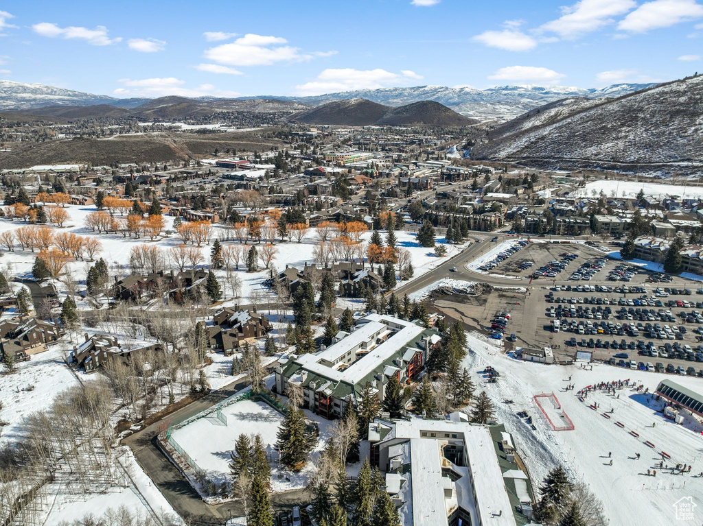 Snowy aerial view with a mountain view