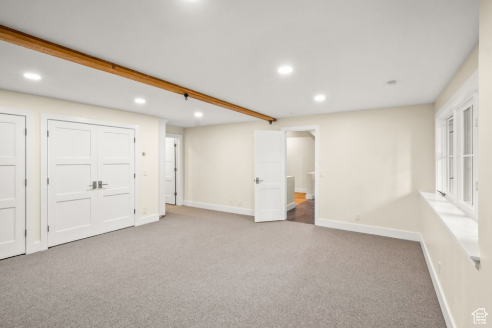 Basement with recessed lighting, baseboards, and carpet floors