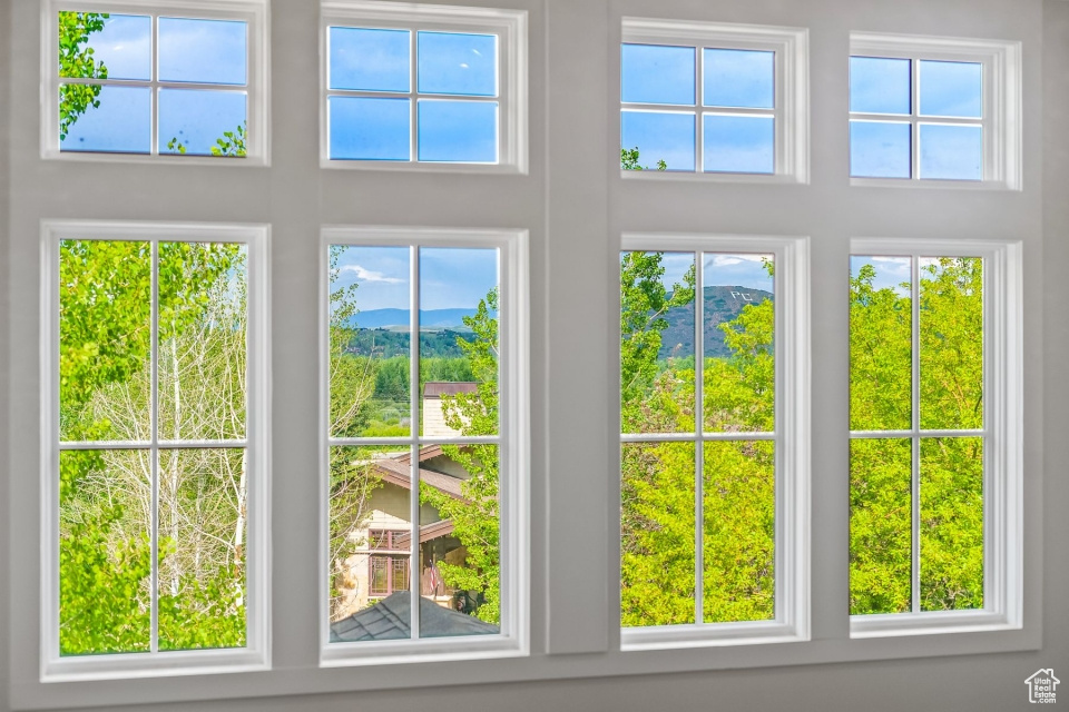 Doorway to outside with a mountain view
