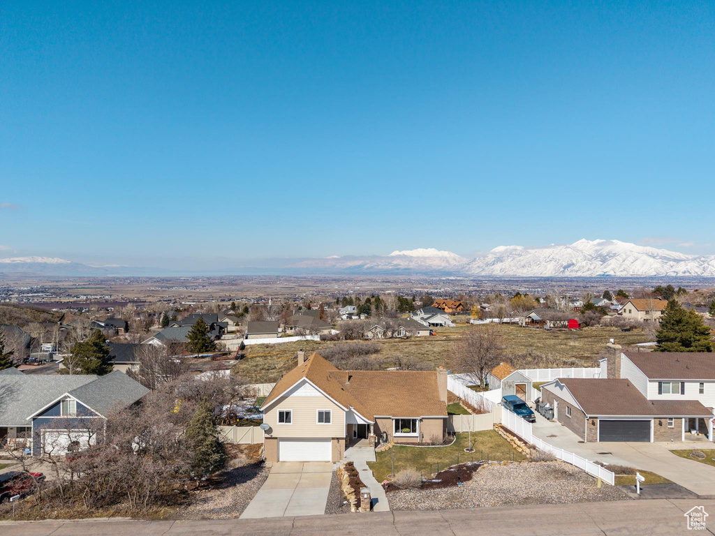 Aerial view featuring a mountain view and a residential view