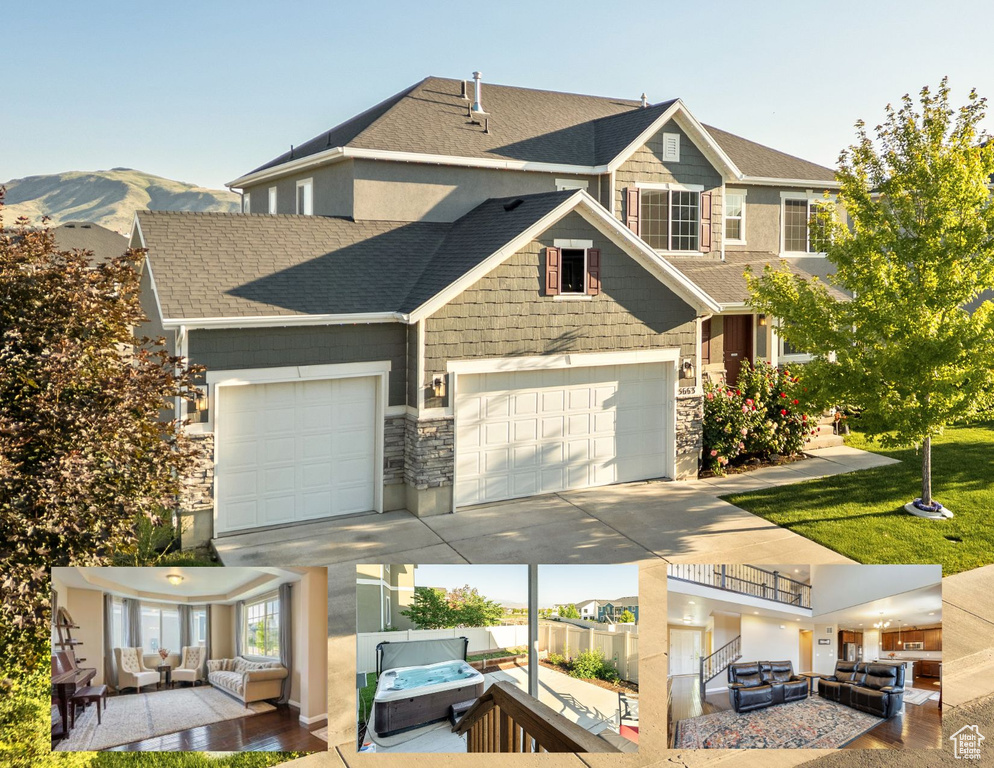 View of front facade with an outdoor living space with a fire pit, concrete driveway, roof with shingles, and stone siding