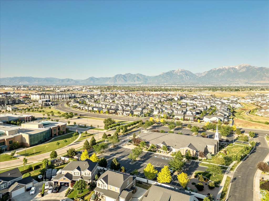 View of property location featuring nearby suburban area and a mountainous background