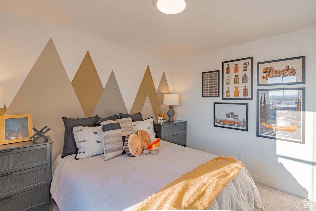 Bedroom featuring carpet flooring