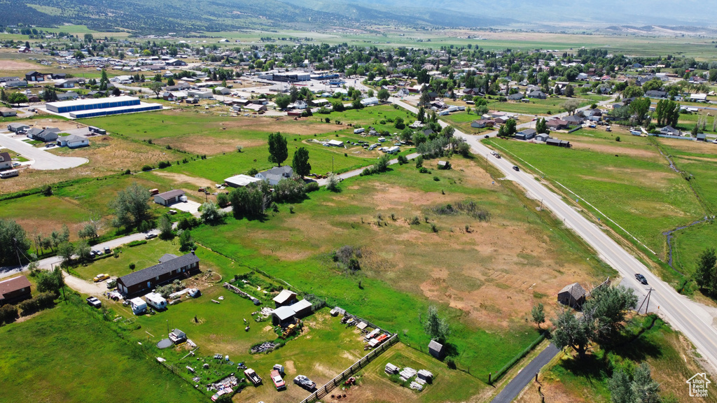 Aerial overview of property's location featuring a mountain backdrop