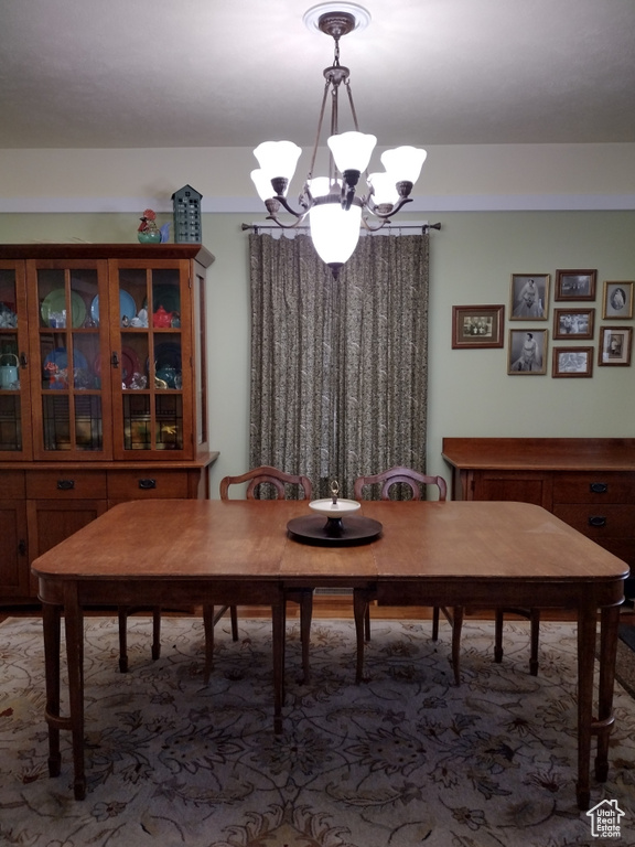 Dining space featuring an inviting chandelier