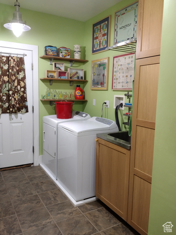 Clothes washing area with cabinet space and washing machine and dryer