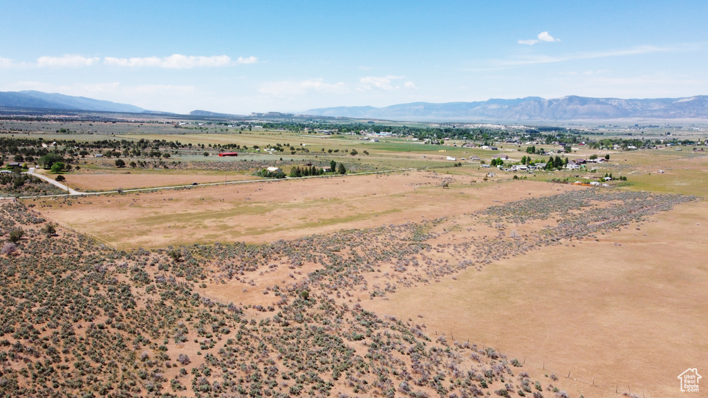View of mountain background featuring rural landscape