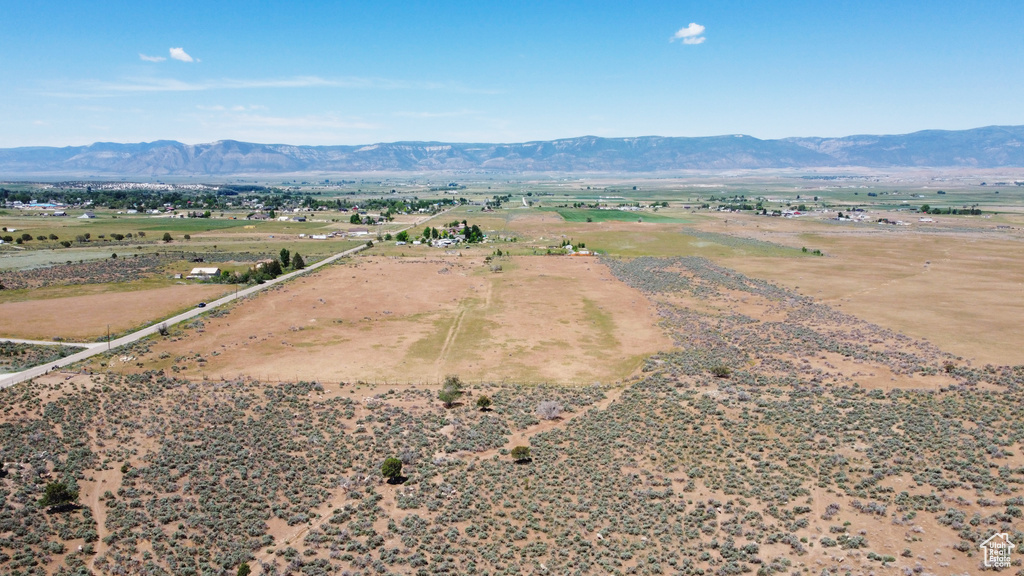 Overview of rural landscape with a mountain backdrop