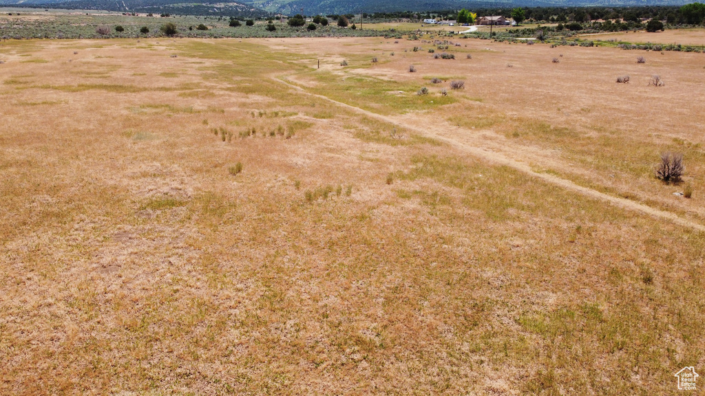 Aerial view of sparsely populated area featuring a mountainous background