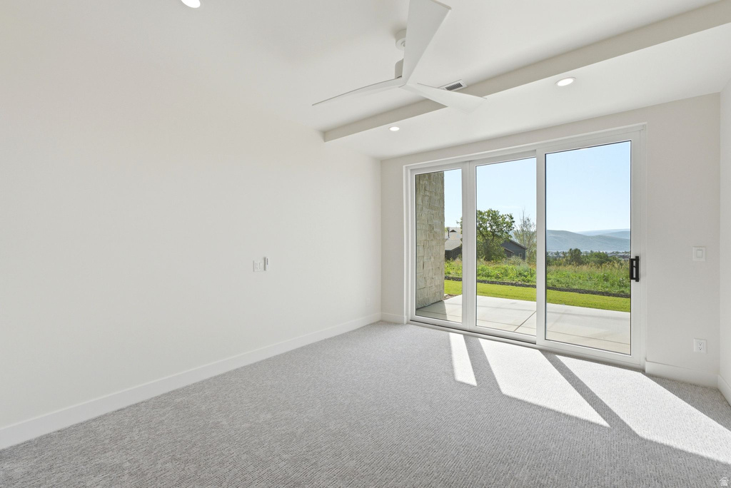 Sliding glass doors opening to outdoor patio