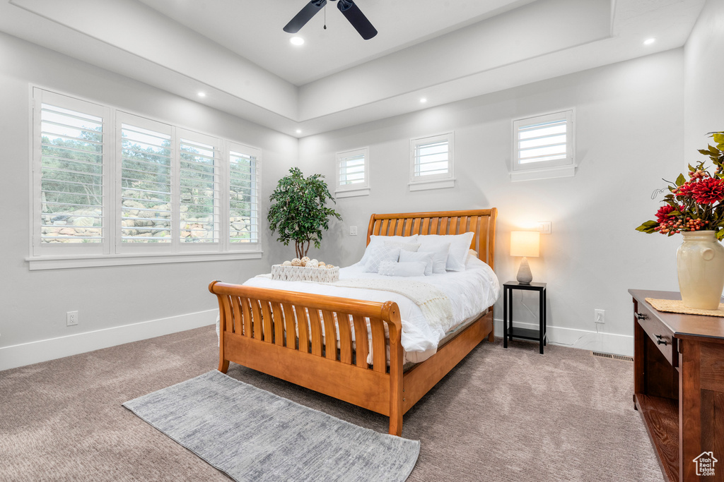 Carpeted bedroom with recessed lighting, baseboards, and ceiling fan