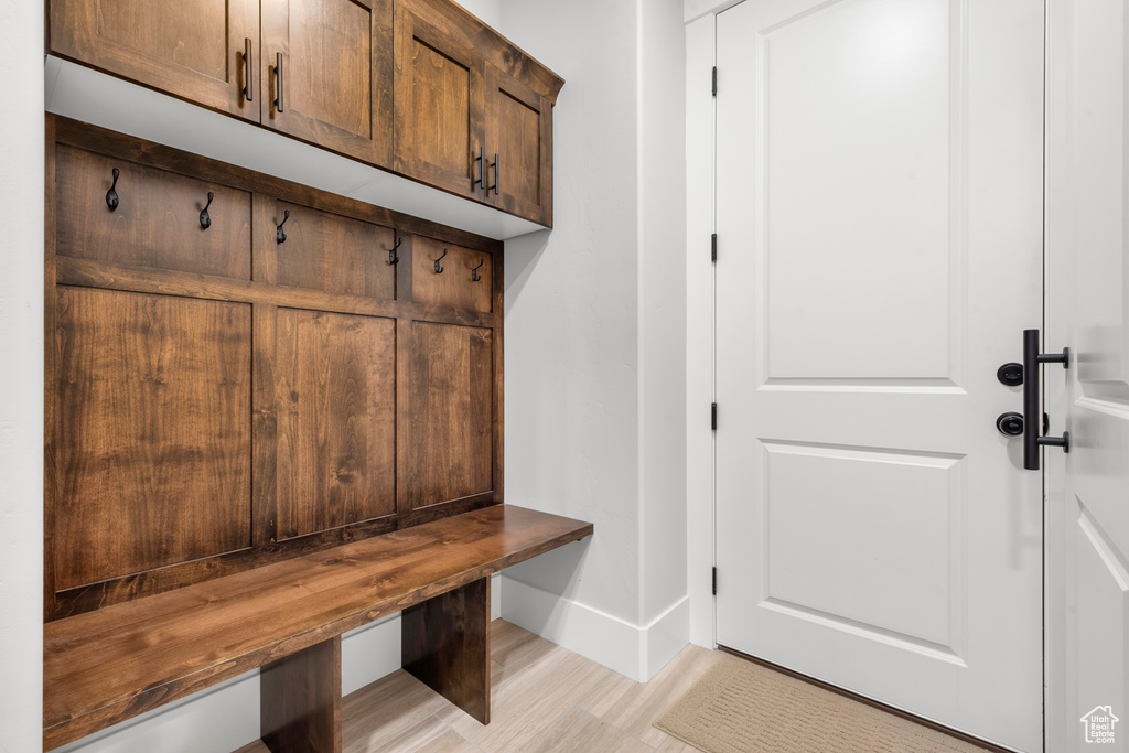 Mudroom featuring baseboards