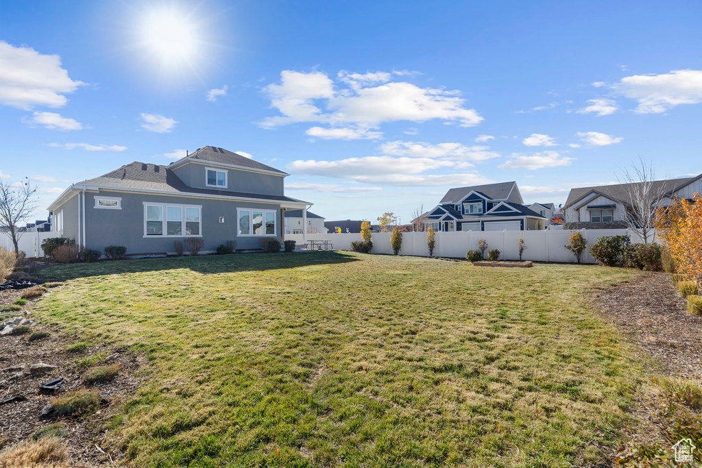 View of yard with a fenced backyard