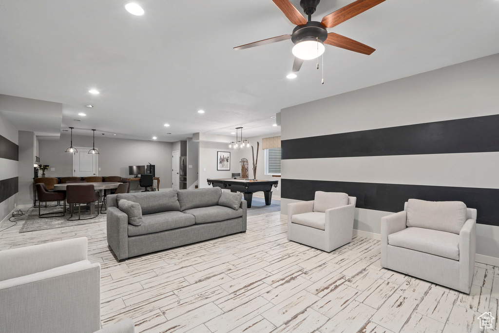 Living area featuring recessed lighting, baseboards, ceiling fan, and billiards
