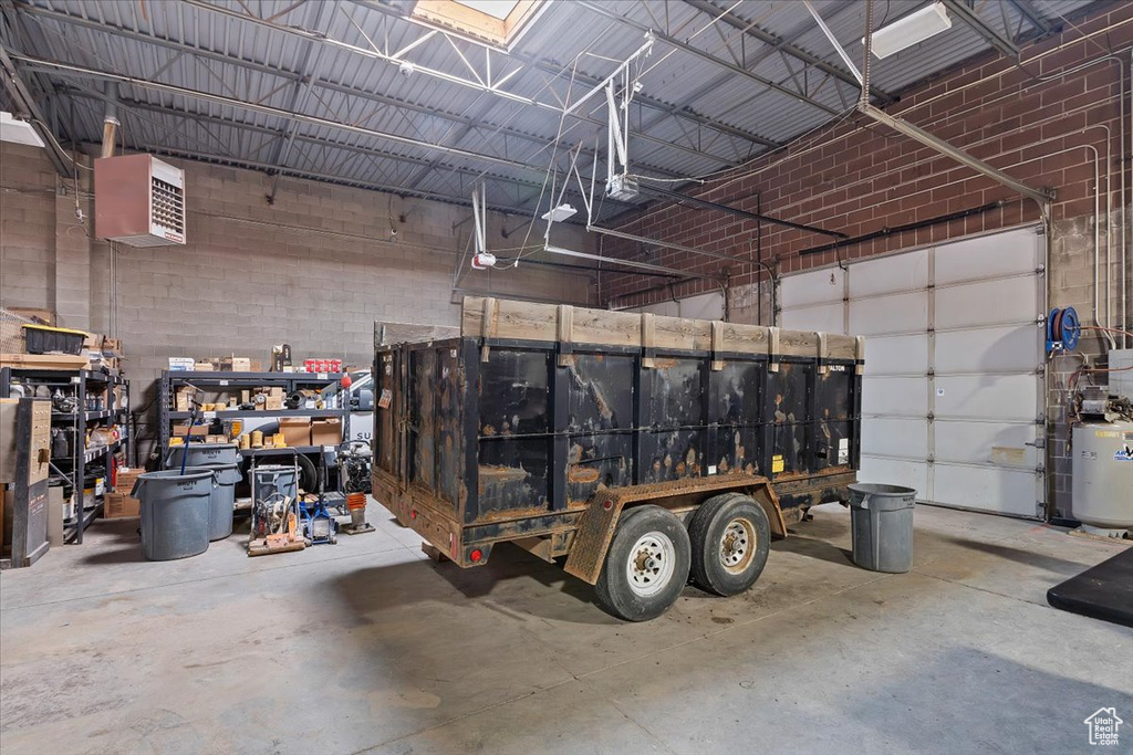 Garage featuring metal wall