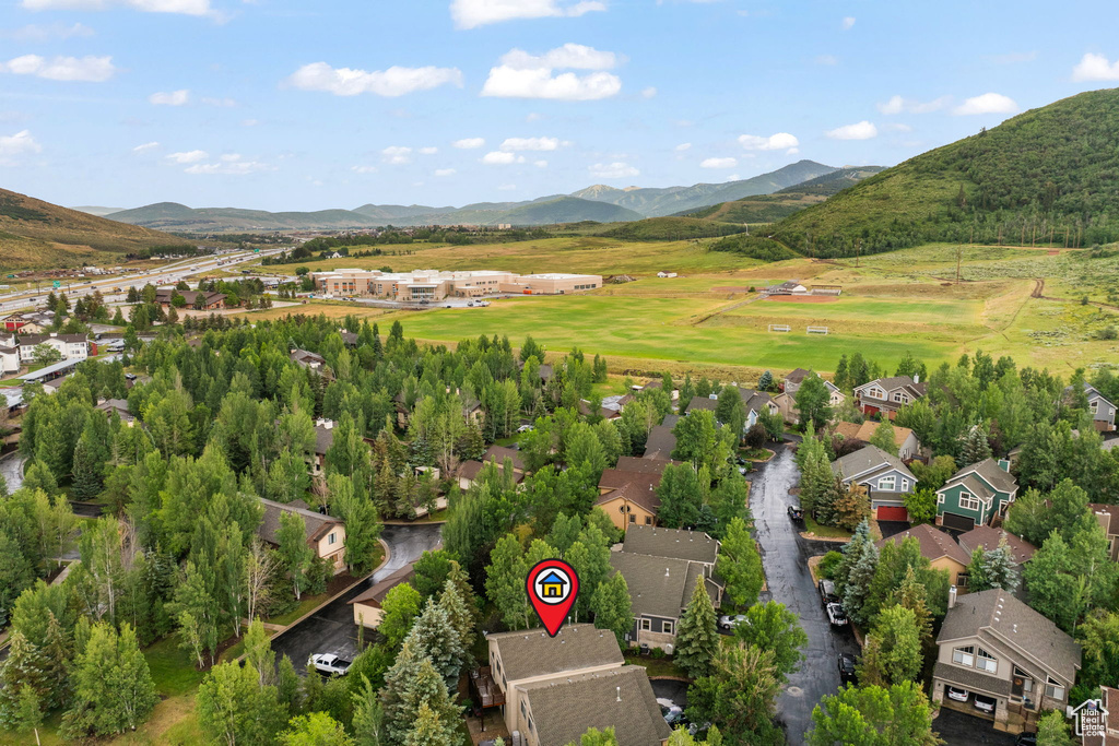 Aerial perspective of suburban area with mountains