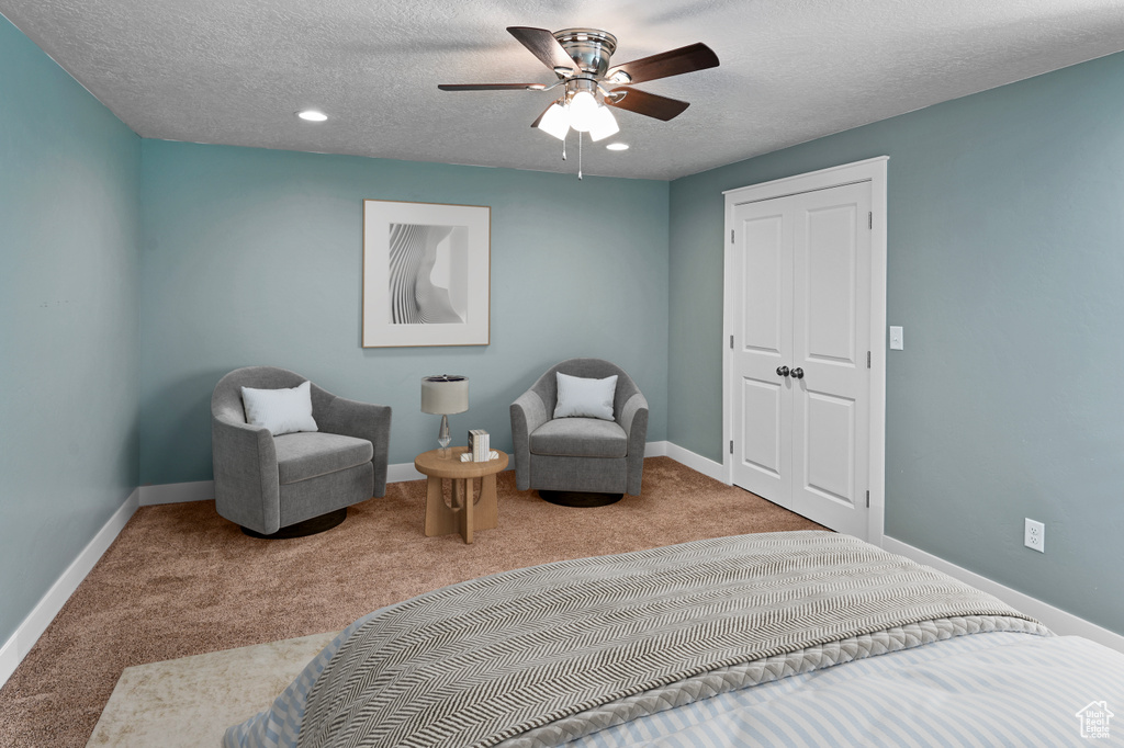 Bedroom featuring carpet, a textured ceiling, baseboards, a ceiling fan, and recessed lighting