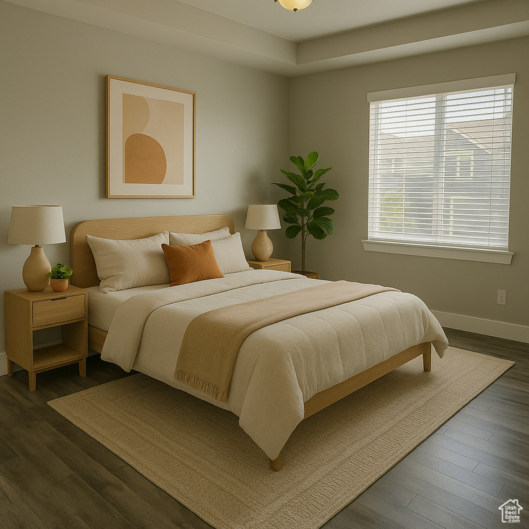Bedroom with baseboards and dark wood-type flooring